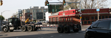 picture of flat bed truck on East First Street